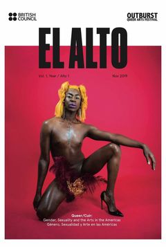 A magazine cover with a Black person posing close to the ground wearing a yellow wig.